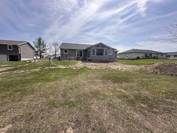 Green backyard before pool pad construction, residential property Missouri