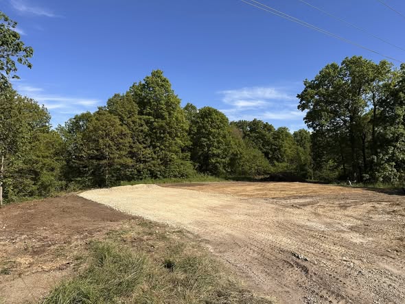 Cleared site with graded pad and driveway after mobile home removal, Missouri